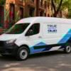 Why should vehicle lettering and graphics be professionally installed?